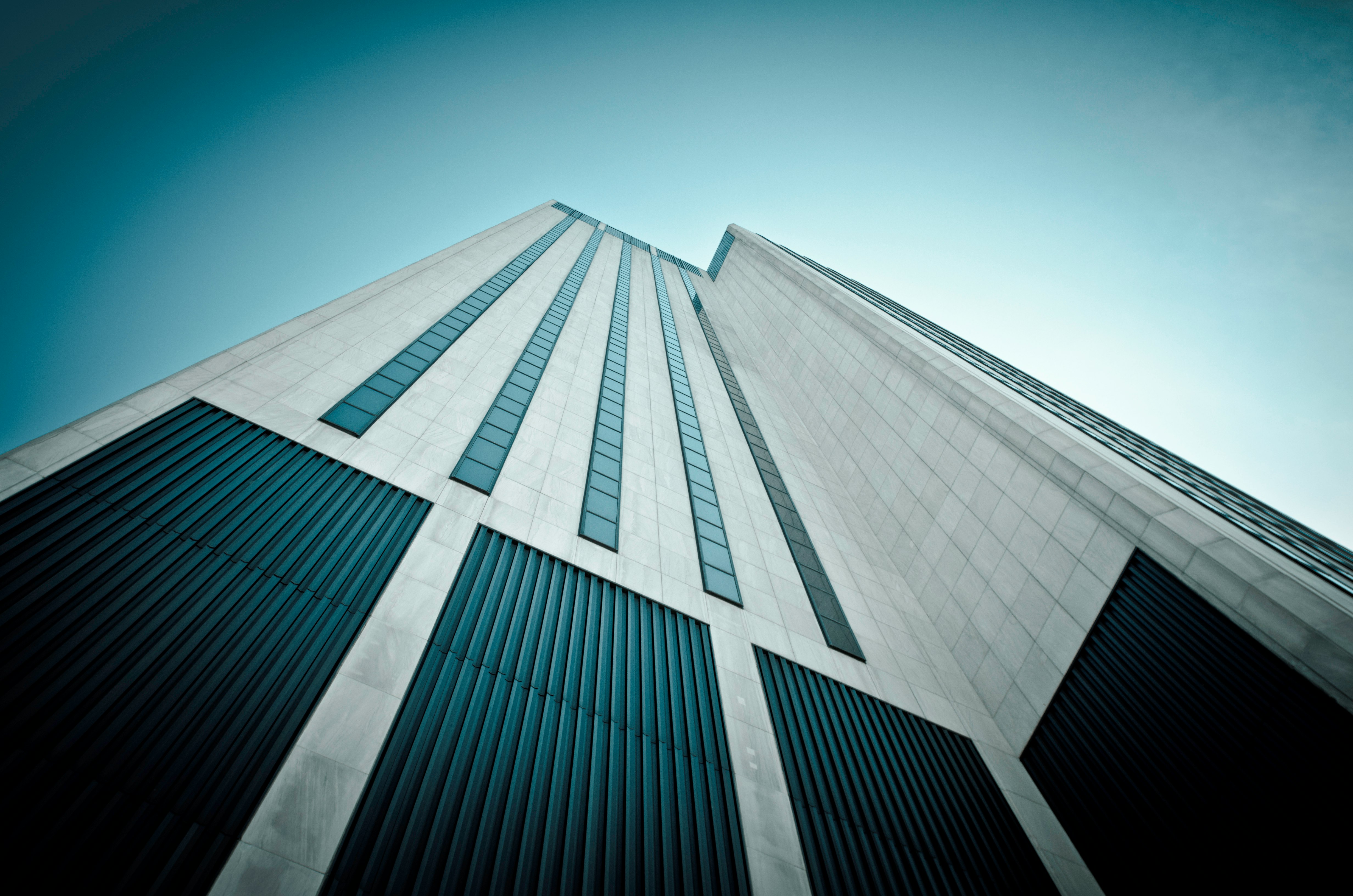 worm's eyeview of white and black concrete building